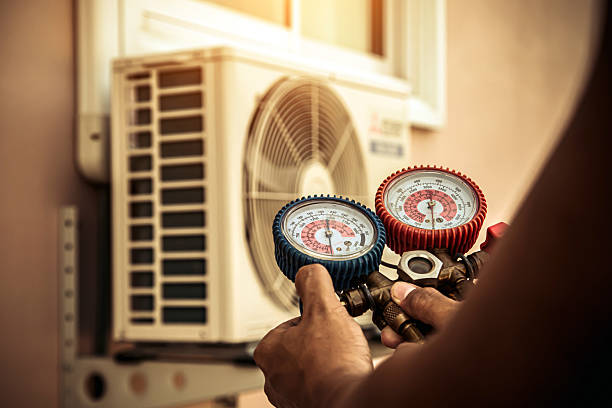 Professional Air Conditioning Service technician working in Fort Mill, SC